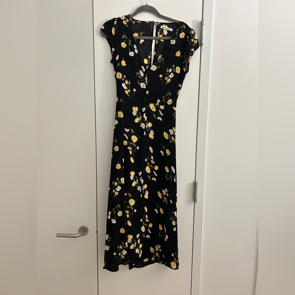 Reformation size 4 black floral with cut-out back and front slit.